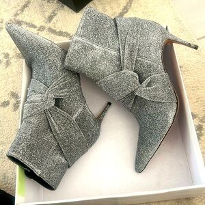 Silver Adrian boots from Schutz with box.